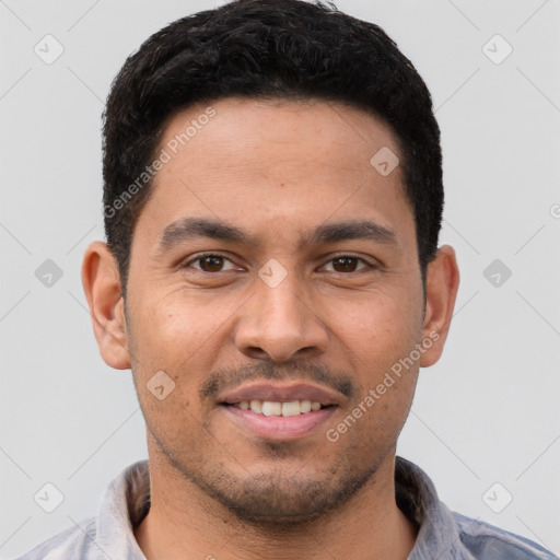 Joyful white young-adult male with short  black hair and brown eyes