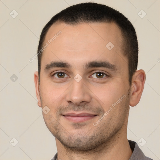 Joyful white young-adult male with short  brown hair and brown eyes