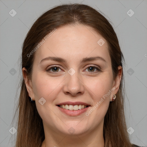 Joyful white young-adult female with long  brown hair and grey eyes