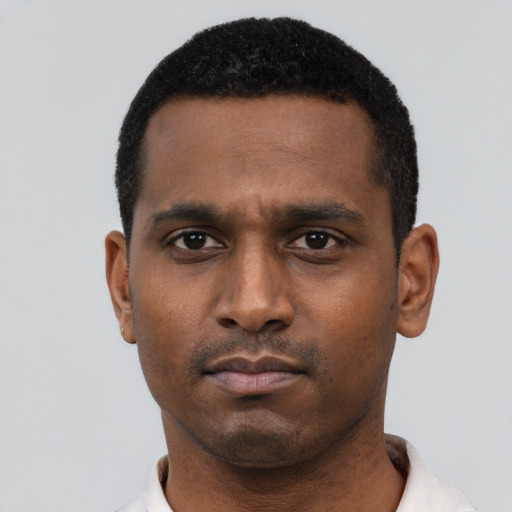 Neutral black young-adult male with short  black hair and brown eyes