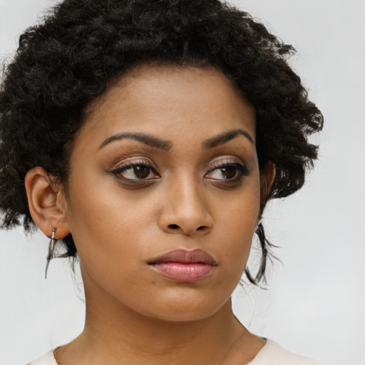 Neutral latino young-adult female with medium  brown hair and brown eyes