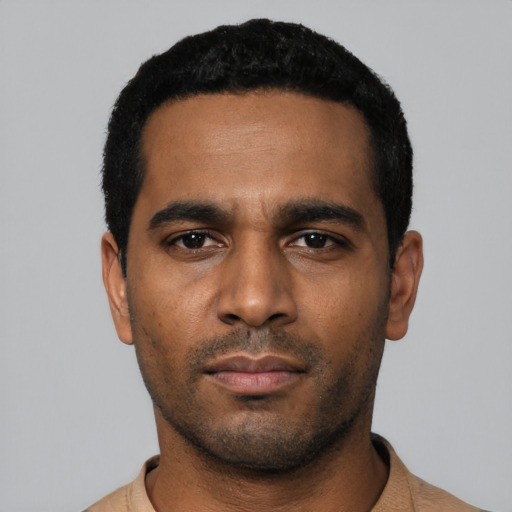 Neutral black young-adult male with short  black hair and brown eyes