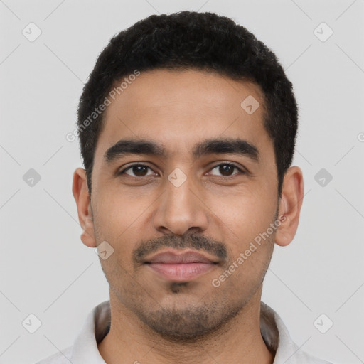 Neutral latino young-adult male with short  black hair and brown eyes