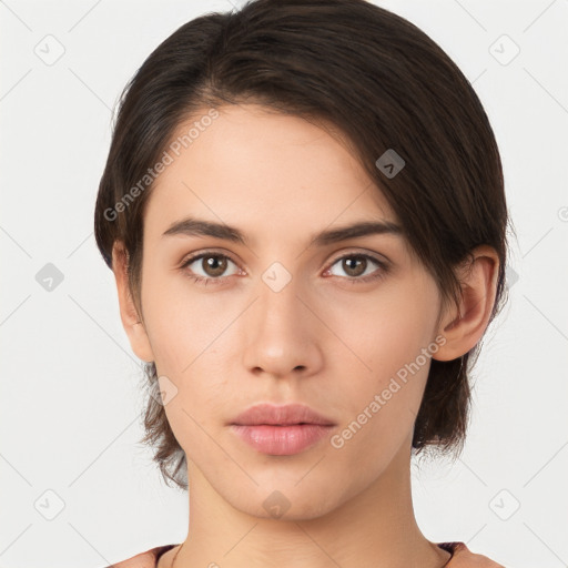 Neutral white young-adult female with medium  brown hair and brown eyes