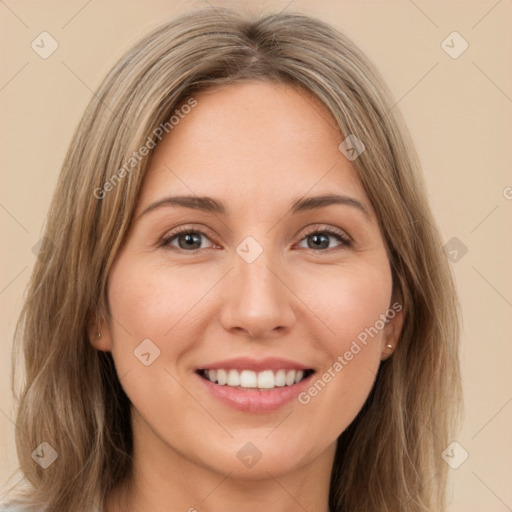 Joyful white young-adult female with long  brown hair and brown eyes