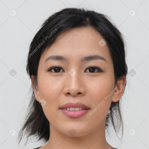 Joyful asian young-adult female with medium  brown hair and brown eyes