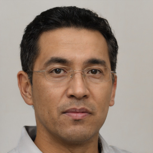 Neutral asian adult male with short  black hair and brown eyes