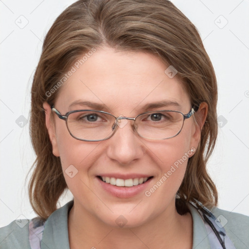 Joyful white young-adult female with medium  brown hair and blue eyes