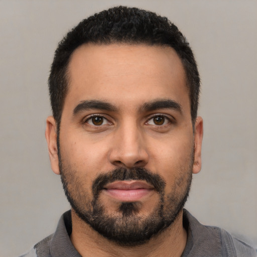 Neutral latino young-adult male with short  black hair and brown eyes