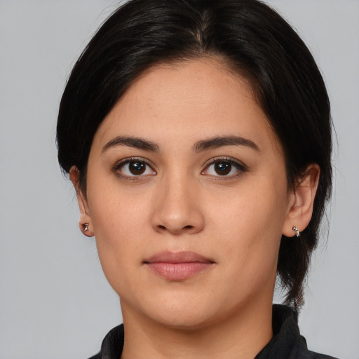 Neutral white young-adult female with medium  black hair and brown eyes