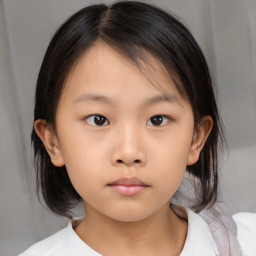 Neutral asian child female with medium  brown hair and brown eyes