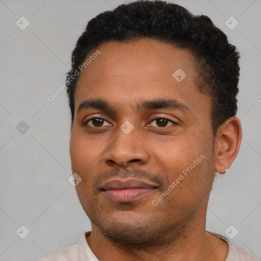 Neutral latino young-adult male with short  black hair and brown eyes