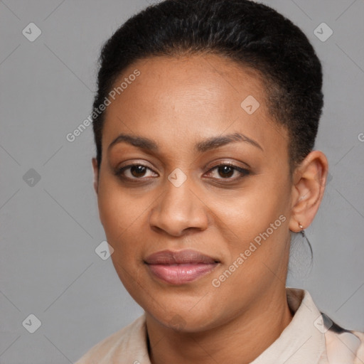 Joyful black young-adult female with short  black hair and brown eyes