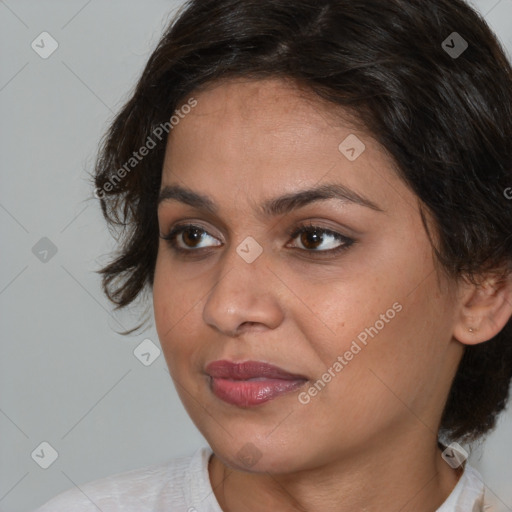 Joyful white young-adult female with medium  brown hair and brown eyes