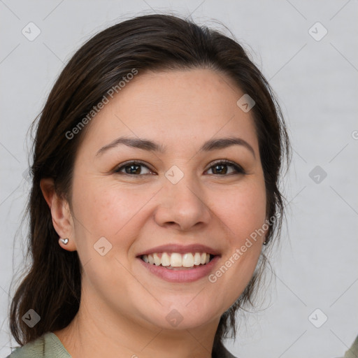 Joyful white young-adult female with medium  brown hair and brown eyes