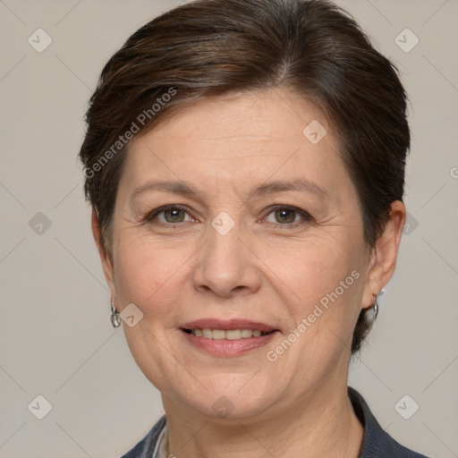 Joyful white adult female with medium  brown hair and brown eyes