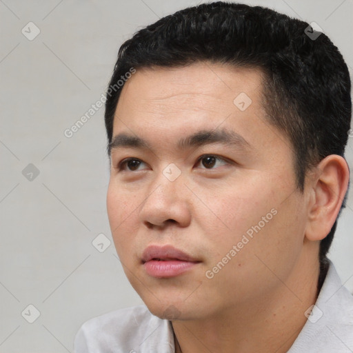 Neutral asian young-adult male with short  black hair and brown eyes