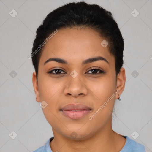 Joyful latino young-adult female with short  black hair and brown eyes