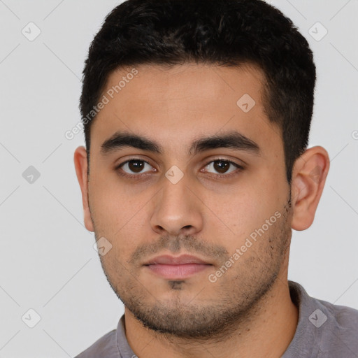 Neutral latino young-adult male with short  black hair and brown eyes