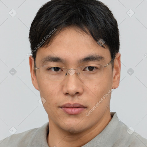 Neutral asian young-adult male with short  brown hair and brown eyes