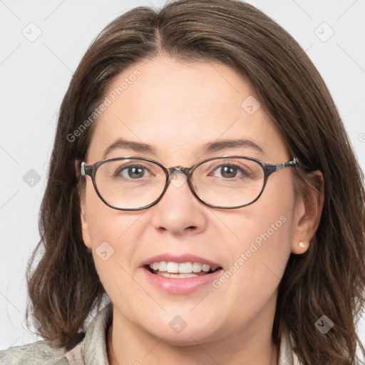 Joyful white adult female with medium  brown hair and grey eyes