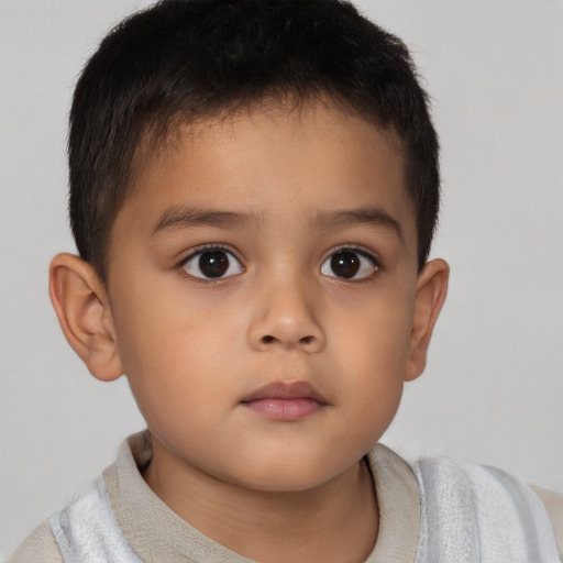 Neutral asian child male with short  brown hair and brown eyes