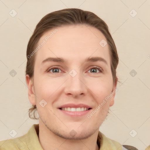 Joyful white young-adult female with short  brown hair and grey eyes