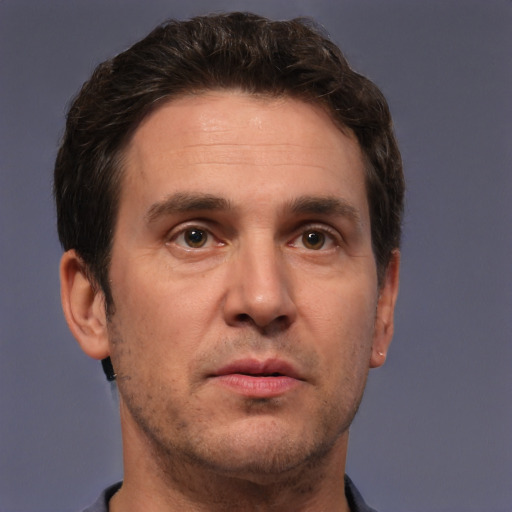 Neutral white adult male with short  brown hair and brown eyes