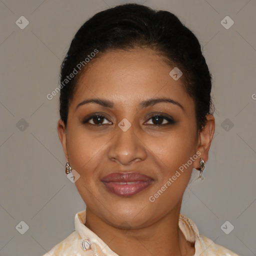 Joyful black young-adult female with short  brown hair and brown eyes