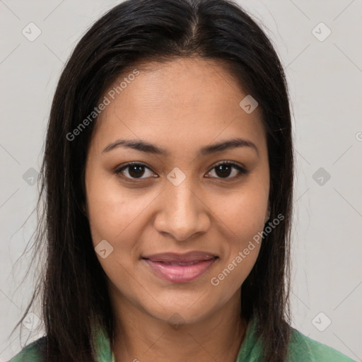 Joyful latino young-adult female with long  brown hair and brown eyes