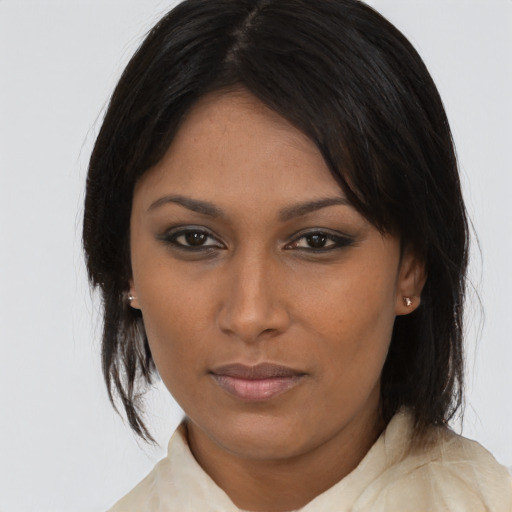 Neutral black young-adult female with medium  brown hair and brown eyes