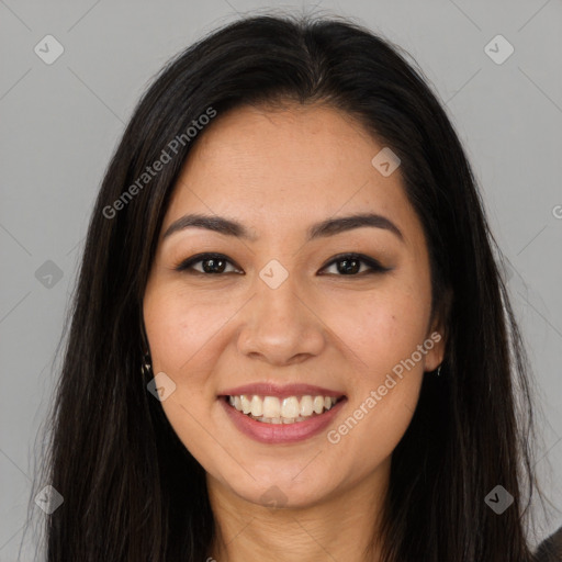 Joyful white young-adult female with long  brown hair and brown eyes