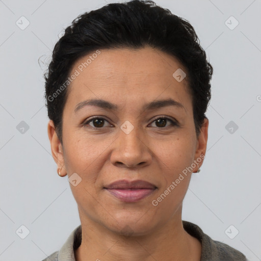 Joyful latino young-adult female with short  black hair and brown eyes