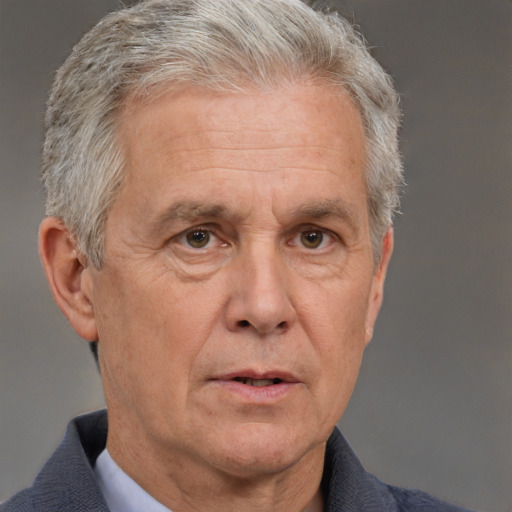 Neutral white middle-aged male with short  gray hair and blue eyes