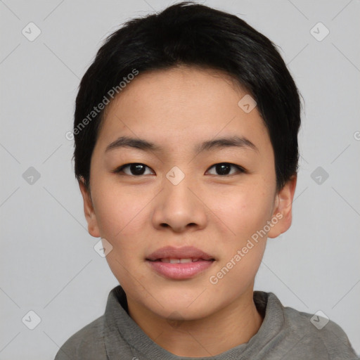 Joyful asian young-adult female with short  black hair and brown eyes