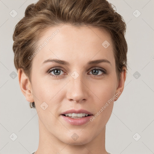 Joyful white young-adult female with short  brown hair and grey eyes