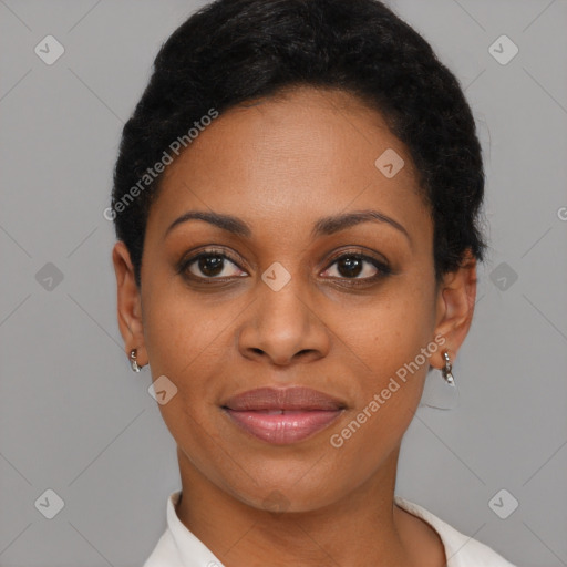 Joyful black young-adult female with short  brown hair and brown eyes