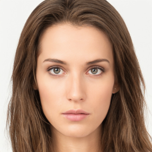 Neutral white young-adult female with long  brown hair and brown eyes