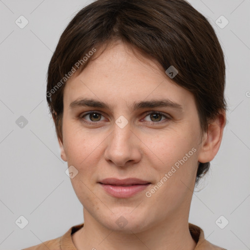 Joyful white young-adult female with short  brown hair and brown eyes