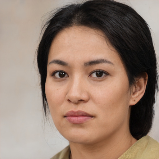 Neutral asian young-adult female with medium  brown hair and brown eyes