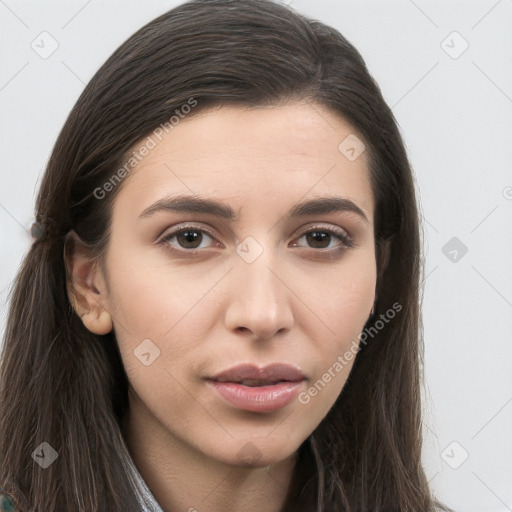 Neutral white young-adult female with long  brown hair and brown eyes