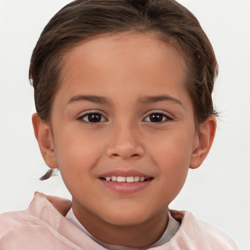 Joyful white child female with short  brown hair and brown eyes