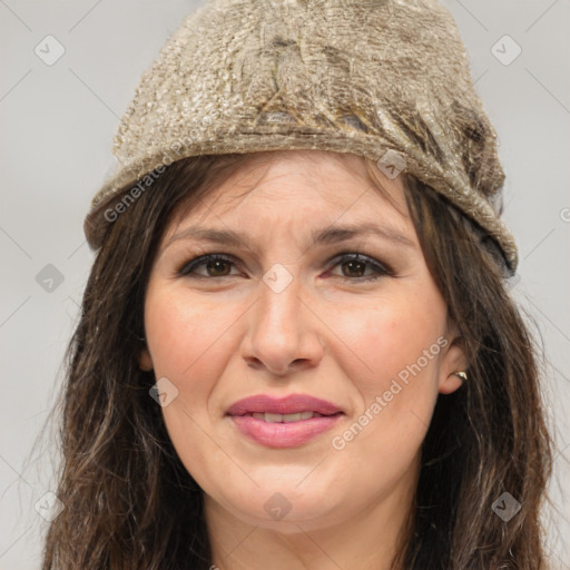 Joyful white adult female with long  brown hair and brown eyes