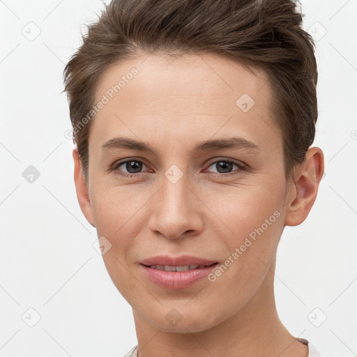 Joyful white young-adult female with short  brown hair and grey eyes