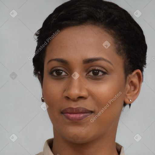 Joyful black young-adult female with short  brown hair and brown eyes