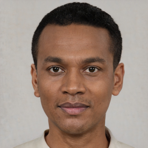 Neutral black young-adult male with short  black hair and brown eyes