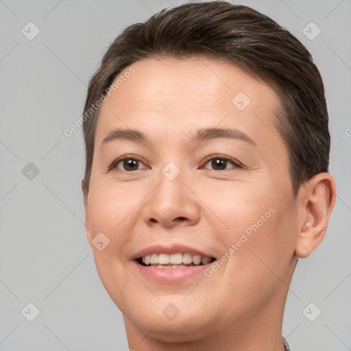 Joyful white young-adult female with short  brown hair and brown eyes