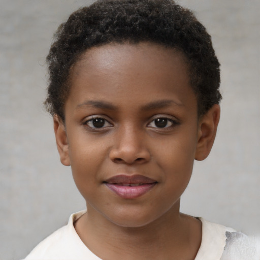 Joyful black child female with short  brown hair and brown eyes