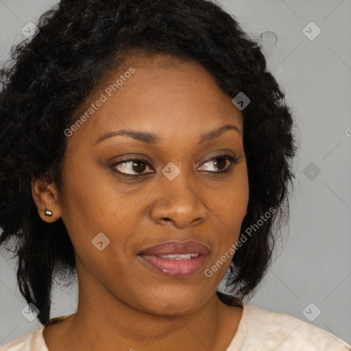 Joyful black young-adult female with medium  brown hair and brown eyes