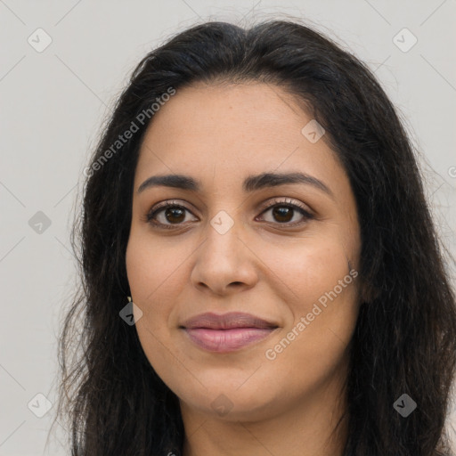 Joyful latino young-adult female with long  brown hair and brown eyes